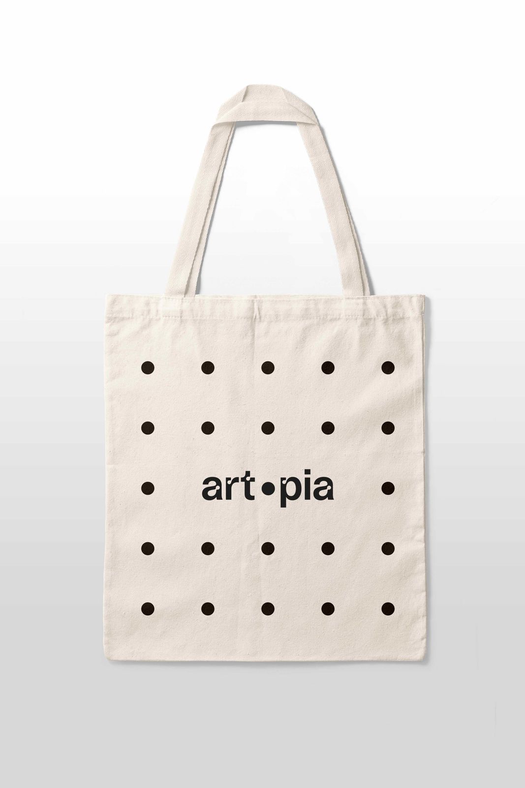 Tote bag with dot pattern and art·pia logo