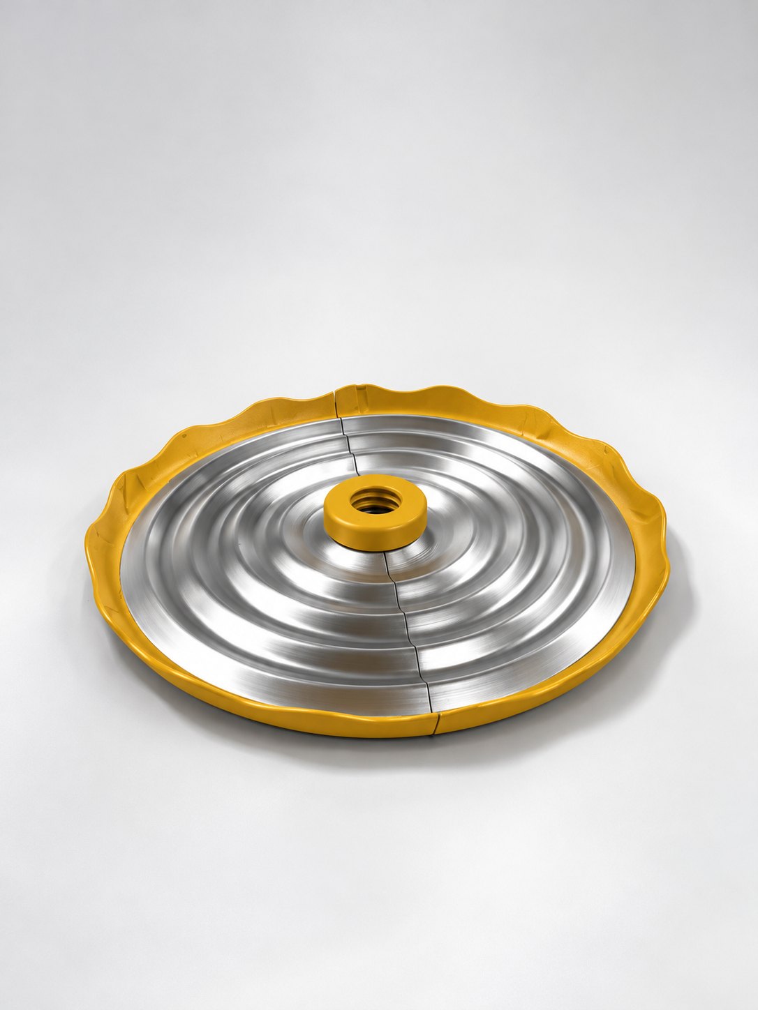 The yellow-rimmed “Skirt” lid on its own
